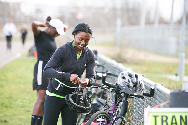 woman getting ready for a bike ride